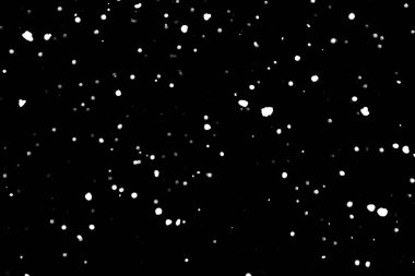 siyah kar bokeh arka plan üzerinde beyaz noktalar