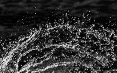 bir karanlık bokeh arka plan üstünde su damlaları