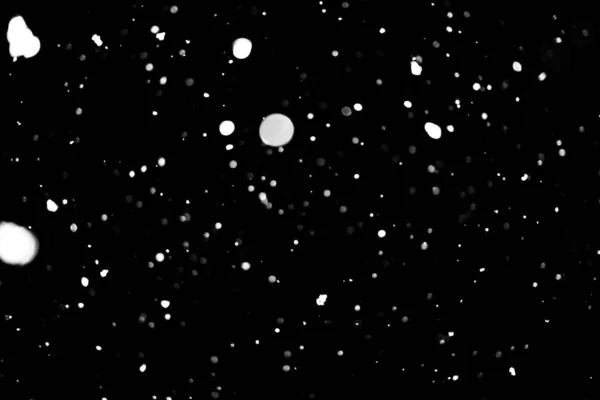 Bílé Tečky Černém Sníh Bokeh Pozadí — Stock fotografie