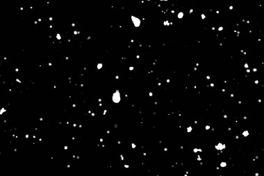 siyah kar bokeh arka plan üzerinde beyaz noktalar