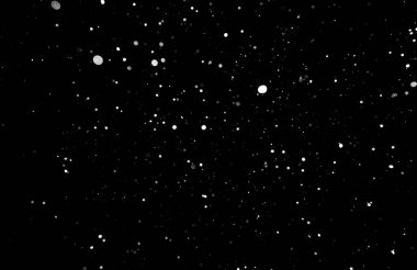 Kar fırtınası doku. Siyah arka plan, ışıkları bokeh vurdu kar taneleri havada uçan