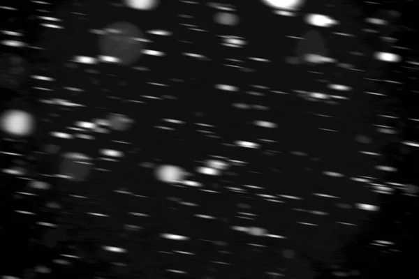 Puntini Bianchi Neve Movimento Sfondo Nero Sfocato — Foto Stock