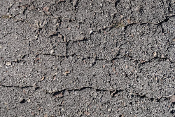 Oud Asfalt Achtergrond Met Een Barst — Stockfoto