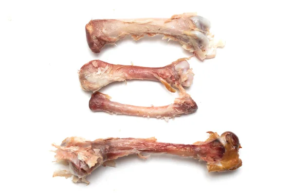 白い背景の上を食べた後の鶏の骨 — ストック写真