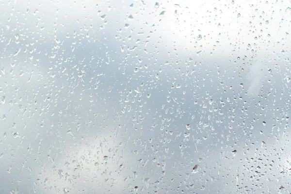 Gotas Lluvia Sobre Fondo Cristal Cielo —  Fotos de Stock