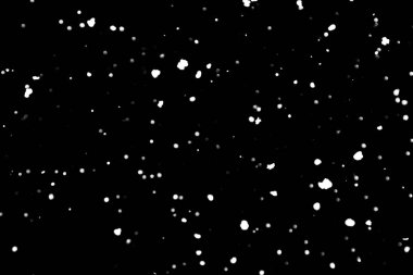 siyah kar bokeh arka plan üzerinde beyaz noktalar