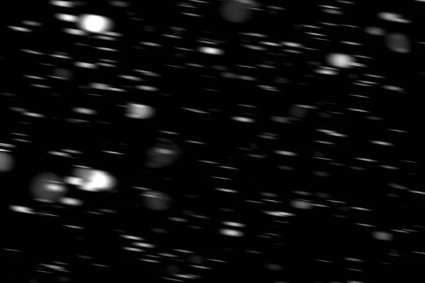 Άσπρες Κουκκίδες Χιόνι Κίνηση Μαύρο Φόντο Θολή — Φωτογραφία Αρχείου