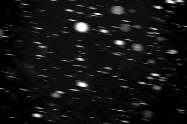 Hareket Bulanık Siyah Bir Arka Plan Üzerinde Beyaz Noktalar Kar — Stok fotoğraf