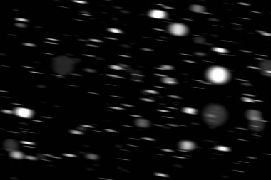 hareket bulanık siyah bir arka plan üzerinde beyaz noktalar kar