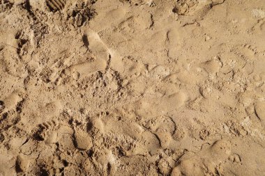 ayak izleri arka plan ile kum