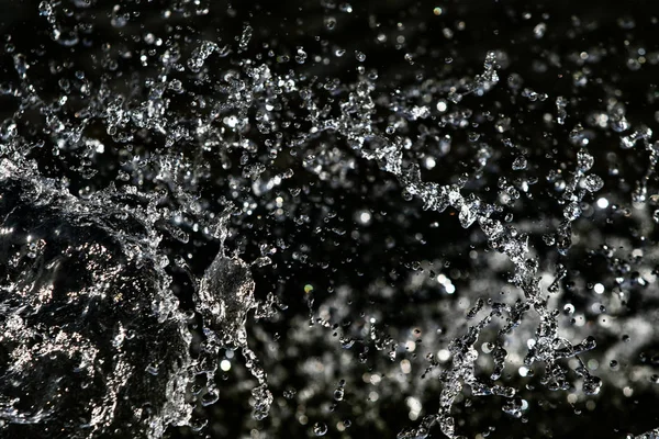 Gotas Agua Aire Sobre Fondo Bokeh Oscuro — Foto de Stock