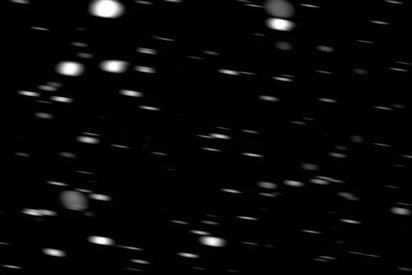 Άσπρες Κουκκίδες Χιόνι Κίνηση Μαύρο Φόντο Θολή — Φωτογραφία Αρχείου