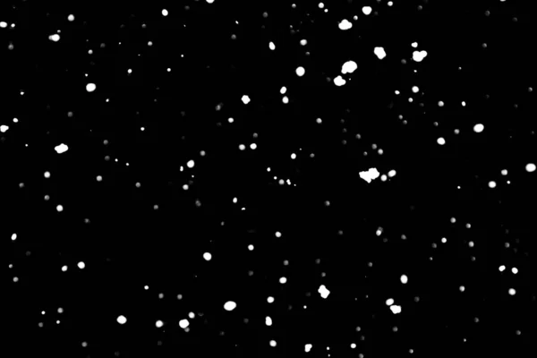 白点在黑色雪 Bokeh — 图库照片