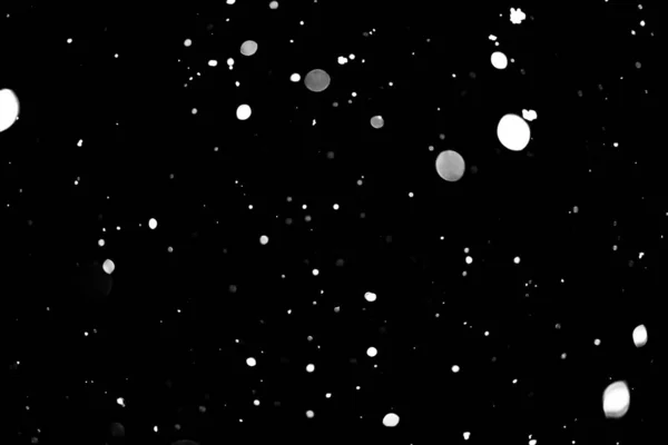 White Dots Black Snow Bokeh Background — Stock Photo, Image