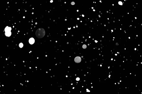 White Dots Black Snow Bokeh Background — Stock Photo, Image