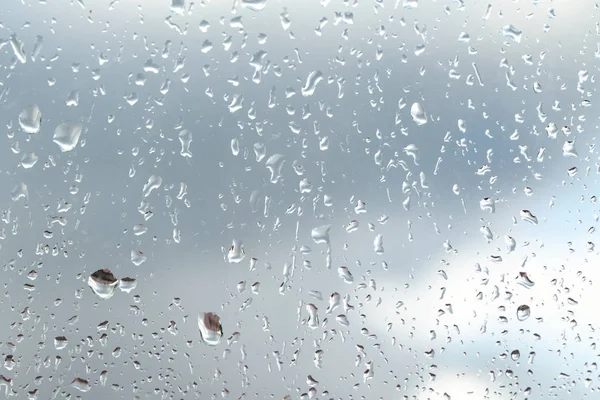 Gotas Lluvia Sobre Fondo Cristal Cielo —  Fotos de Stock