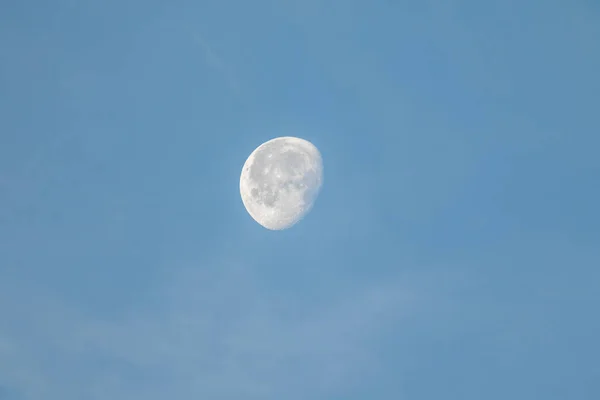 beautiful view of moon on blue sky
