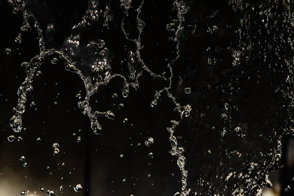 Water Splash Donker Met Een Druppels Water Vliegen Intreepupil Bokeh — Stockfoto