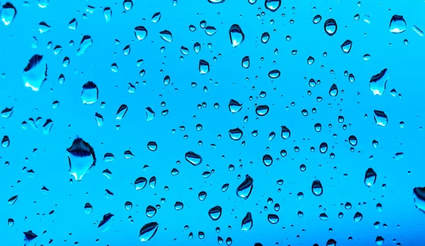 Gotas Água Sobre Fundo Azul Macro — Fotografia de Stock