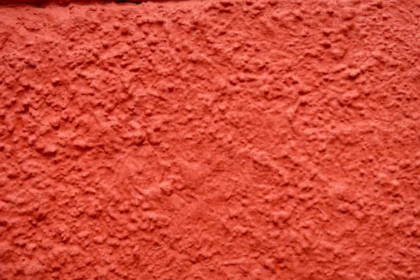 コンクリート壁石膏赤カラー背景 — ストック写真