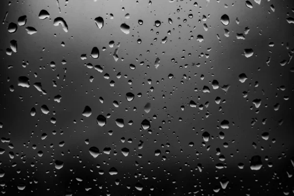 Gocce Pioggia Uno Sfondo Vetro Scuro — Foto Stock