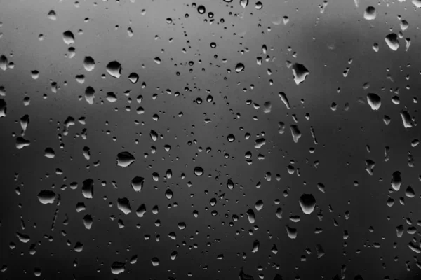 Regendruppels Achtergrond Van Een Donker Glas — Stockfoto