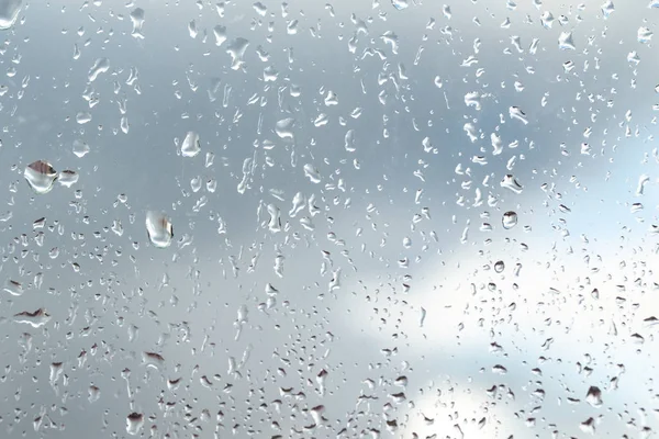 Gotas Lluvia Sobre Fondo Cristal Cielo —  Fotos de Stock