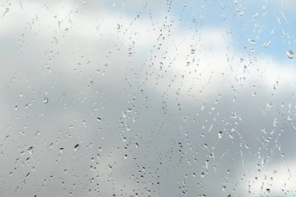 Gotas Lluvia Sobre Fondo Cristal Cielo —  Fotos de Stock