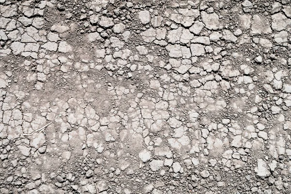 ひび割れた乾燥大地 抽象的な背景 — ストック写真