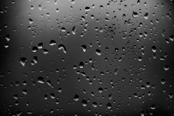 Gocce Pioggia Uno Sfondo Vetro Scuro — Foto Stock