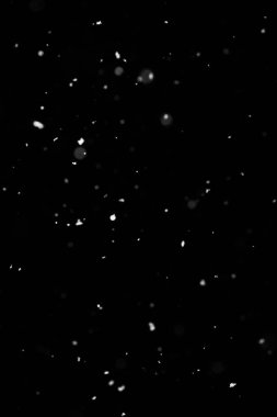 Kar fırtınası doku. Siyah arka plan, ışıkları bokeh vurdu kar taneleri havada uçan