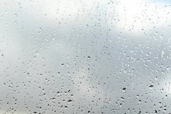 Gotas Lluvia Sobre Fondo Cristal Cielo —  Fotos de Stock