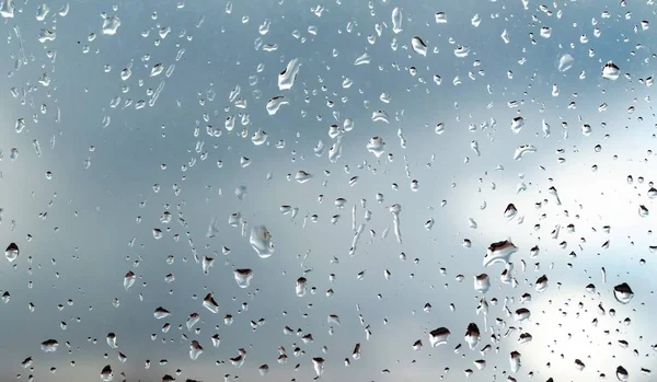 Gotas Lluvia Sobre Fondo Cristal Cielo —  Fotos de Stock