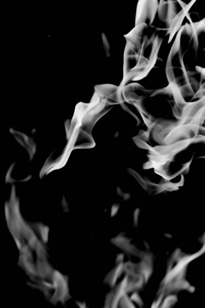 White smoke flame on a black background