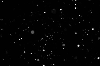 Kar fırtınası doku. Siyah arka plan, ışıkları bokeh vurdu kar taneleri havada uçan