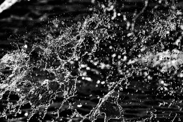 Vand Dråber Luften Mørk Bokeh Baggrund - Stock-foto