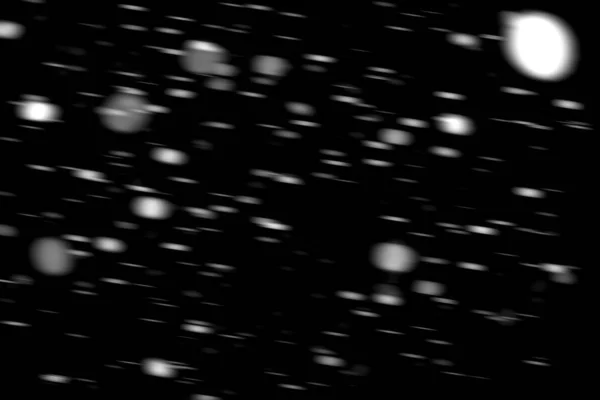 Hareket Bulanık Siyah Bir Arka Plan Üzerinde Beyaz Noktalar Kar — Stok fotoğraf