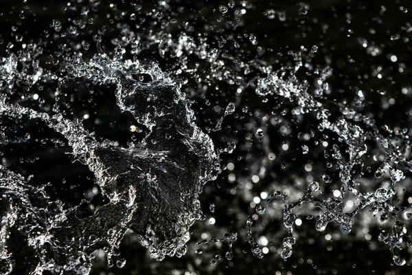 Waterdruppels Lucht Achtergrond Van Een Donker Bokeh — Stockfoto