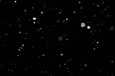 Kar fırtınası doku. Siyah arka plan, ışıkları bokeh vurdu kar taneleri havada uçan