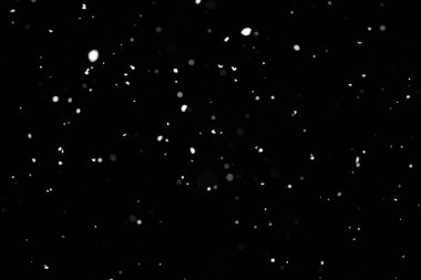 Kar fırtınası doku. Siyah arka plan, ışıkları bokeh vurdu kar taneleri havada uçan