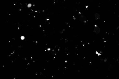 Kar fırtınası doku. Siyah arka plan, ışıkları bokeh vurdu kar taneleri havada uçan