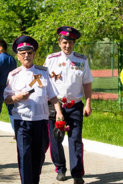 Shymkent, Kazakistan 9 Mayıs 2017: Ölümsüz alayı. Halk festivaller insan. Büyük Vatanseverlik Savaşı 1941-1945, Kızıl Ordu ve Sovyet halkının Zafer Bayramı.