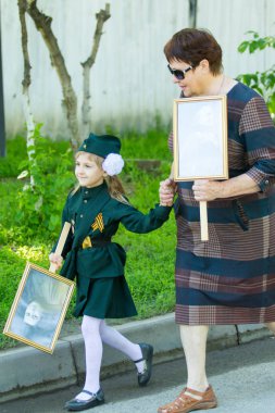 Shymkent, Kazakistan 9 Mayıs 2017: Ölümsüz alayı. Halk festivaller insan. Büyük Vatanseverlik Savaşı 1941-1945, Kızıl Ordu ve Sovyet halkının Zafer Bayramı.