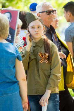 Shymkent, Kazakistan 9 Mayıs 2017: Ölümsüz alayı. Halk festivaller insan. Büyük Vatanseverlik Savaşı 1941-1945, Kızıl Ordu ve Sovyet halkının Zafer Bayramı.