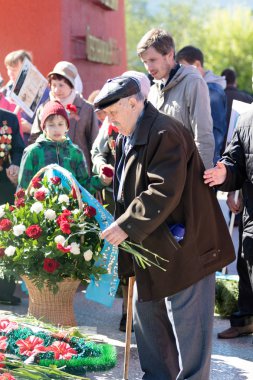 Petropavlovsk, Kazakistan - 9 Mayıs 2016: 9 Mayıs 2016 Petropavlovsk, Kazakistan'daki zafer günü. Ölü savaş anısına. Üyeler mutlu.