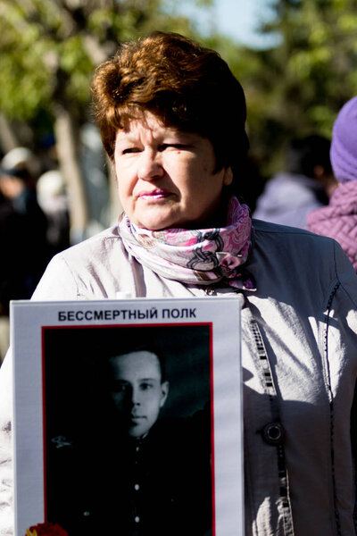 PETROPAVLOVSK MAY 9, 2016: residents in memorable procession "An immortal regiment", on May 9, 2016. Kazakhstan Petropavlovsk.