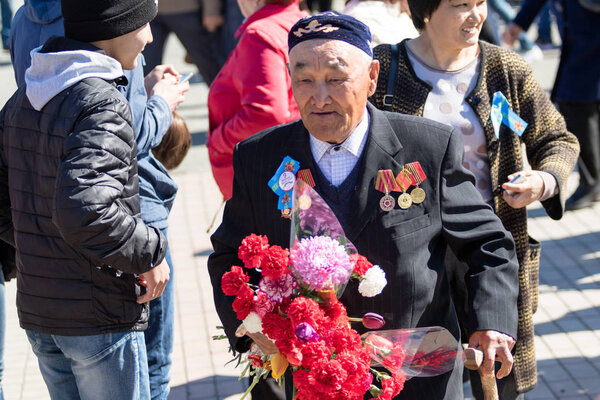 Petropavlovsk, Kazakhstan - MAY 9, 2016: Victory Day on May 9, 2016 in Petropavlovsk, Kazakhstan. In memory of the war dead. Members happy.
