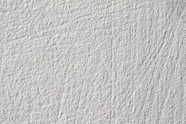 Arka plan doku. Beyaz beton duvar. Yüzeyi küçük çatlaklar.