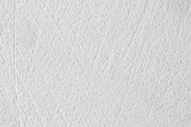 Arka plan doku. Beyaz beton duvar. Yüzeyi küçük çatlaklar.