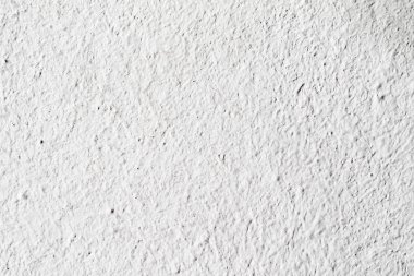 Arka plan doku. Beyaz beton duvar. Yüzeyi küçük çatlaklar.